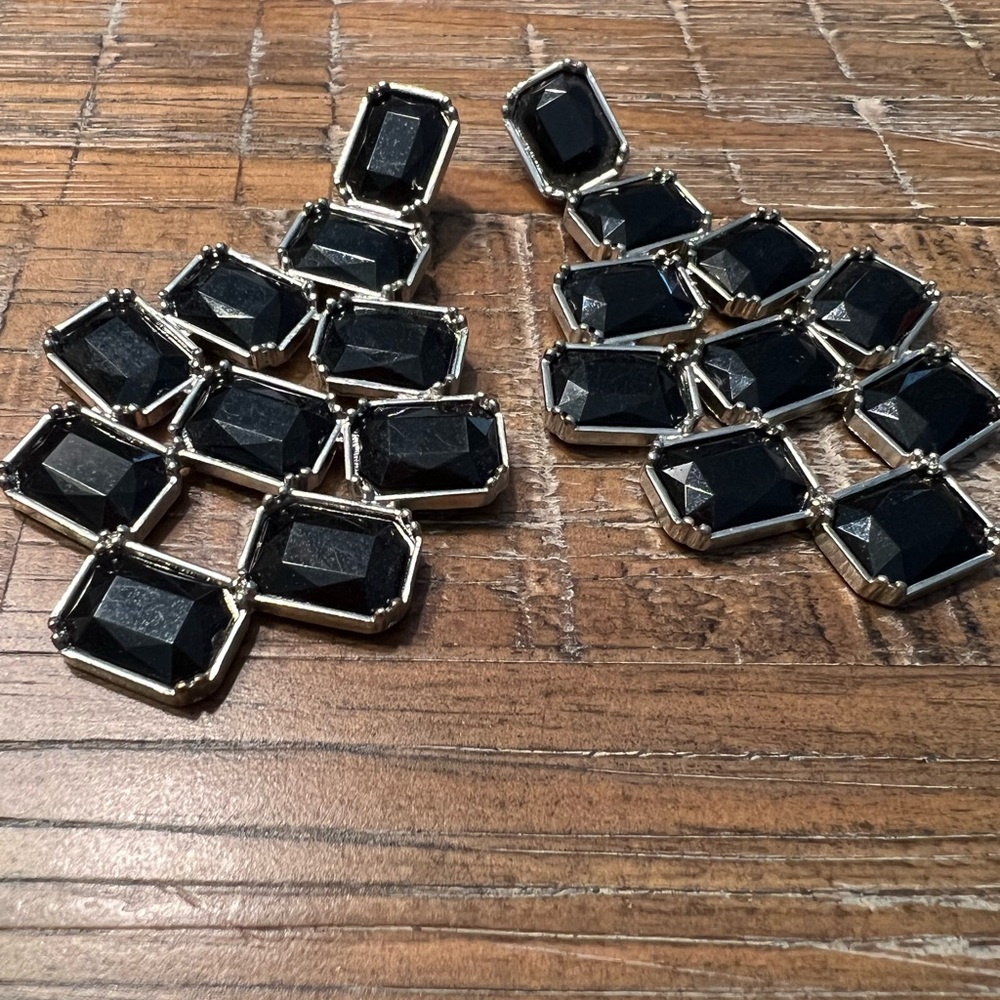Women’s statement earrings by Bebe